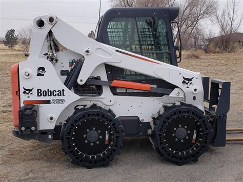 evolution wheel skid steer cost|cost of skid steer tires.